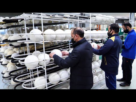 futbol topu yapma süreci. Kore'deki son futbol topu fabrikası