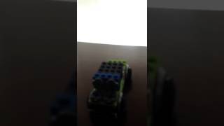 Lego car with subwoofers speakers drops to the bass