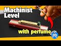Machinist level with a perfume vial
