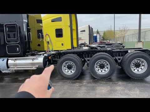 Looking at a 2021 Kenworth T-800 TRI-DRIVE truck