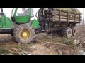 John Deere 1110E logging in spring forest, big load, skilled operator