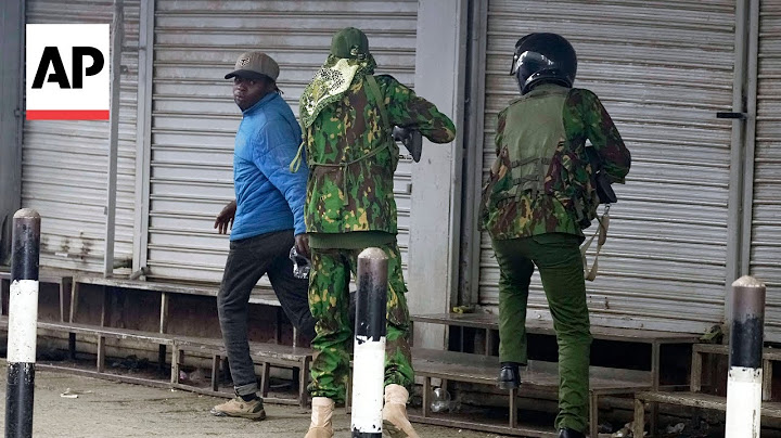 AP photographer recounts capturing a Kenya police officer shooting a man