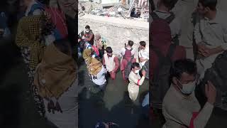 People are standing in Water near KABUL Airport to get out of the country #Shorts | مردم در آب