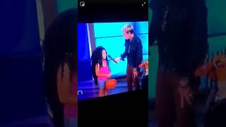 Ellen puts a shoe on a kid dressed as Nicki Minaj and says  it's the one Cardi threw at her