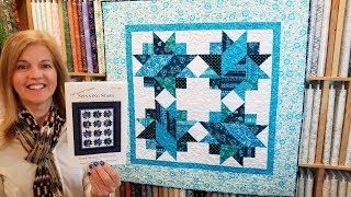 Spinning Stars Blue Metallic Quilt!