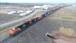 Awesome Aerial 4K View! Long Stack Train CN 120 w/DPU passing thru Moncton, NB