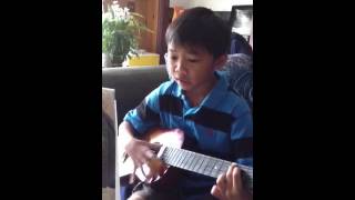 Gary singing and playing By Your Side