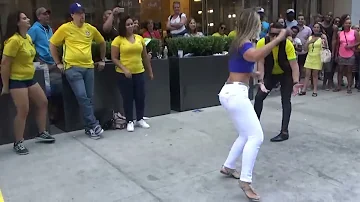 BRAZILIAN GIRL DANCES A BRAZILIAN SAMBA STREET DANCE AT BRAZILIAN CARNIVAL CULTURE PARTY NEW YORK