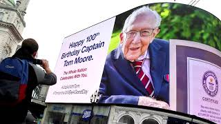 Britain's Captain Tom hospitalized with COVID-19