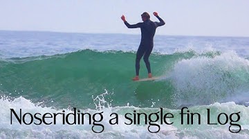 Noseriding a single fin Log - Fraser on a ColourSphere.