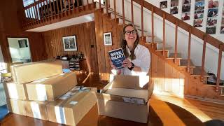 Dr Byrne unboxing her books for her Author Community