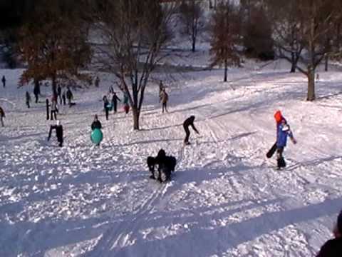 Noah Waller and Brock Hewitt sledding at Shawnee M...