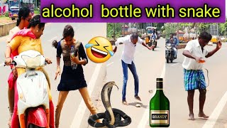 alcohol bottle with snake prank ||public crazy reactions 🤣 ||#comedyvideo #funnyvideo