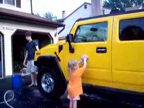 Andrew and Kristina washing "The banana car"