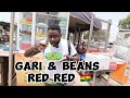 Trying ghanaian street food in accra ghana gari and beans