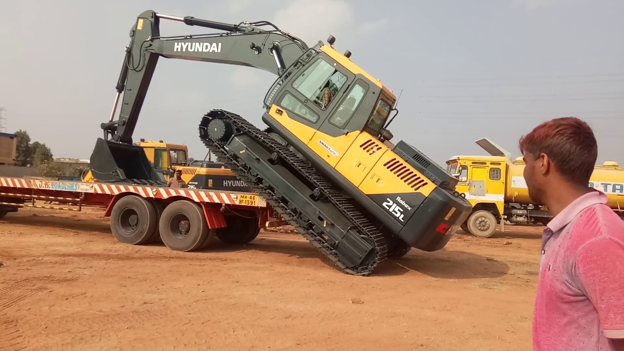 hyundai 215 excavator machine unloading YouTube