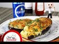 Berenjena rellena con carne y cubierta con queso mozarella y parmesano gratinado