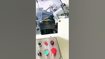 Automatic notebooks holes punching machine