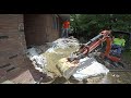 Demolishing a porch with a mini excavator and brush hogging with mini track loader bobcat MT85