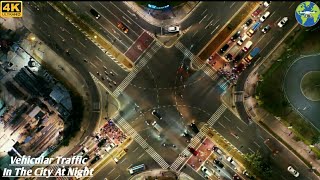 Drone footage of Vehicular Traffic On( A Busy street Intersection In the City at Night)-4K