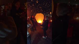 Three Generations Release Wishing Lanterns at Festival