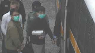 Hong Kong Dissidents Joshua Wong, Ivan Lam Leave Prison For Court Afp