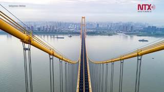 Bombardeo procedimiento pañuelo de papel China abre puente colgante más largo del mundo - YouTube