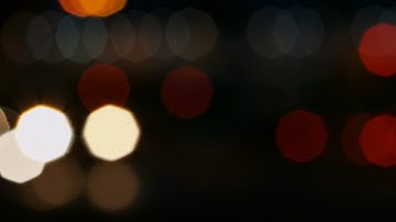 Traffic Lights, Blurred lights & City Night Cars at intersection - 1/7 Free stock video