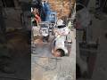 GRINDING OFF EXCESSIVE EDGES IN REPAIRING TRACTOR'S AXEL HOUSING HUB IN MECHANICAL WORKSHOP