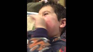 Chasey Sniffing His Feet. Funny.