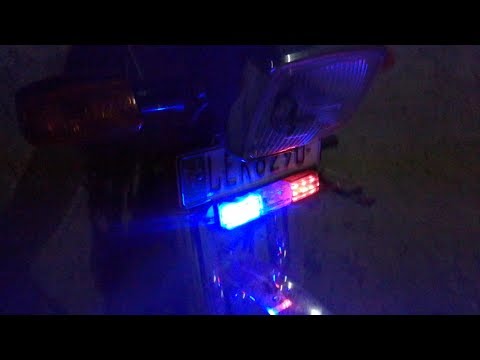 THESE POLICE LIGHTS ON MY BIKE WILL CLEAR THE TRAFFIC