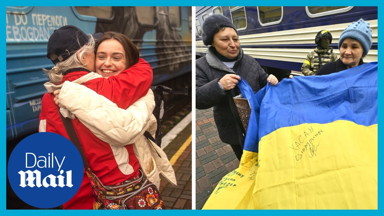 Families reunite as first train arrives in Kherson since Russia invasion