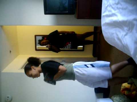 amber alvarez dancing in a hotel room