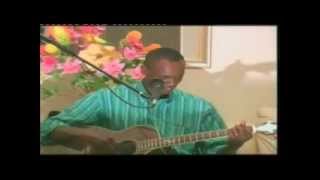 Video thumbnail of "Jean Sylvain Akouala Temple chante PETIT JUNIOR (Guitare seche)"