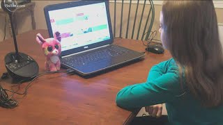 As Georgia COVID cases increase, some districts move to digital learning, APS teachers protest