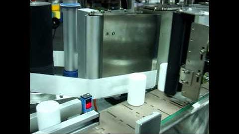 LabelOn Round Bottle Labelling with a Pneumatic Bottle Capture Device