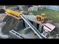 RC wheel loader Volvo L120H in the gravel factory