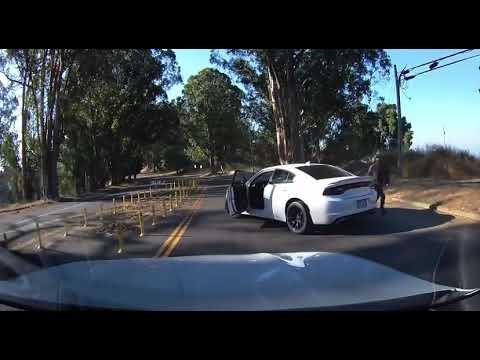 Raw video: woman escapes armed carjacking in Oakland