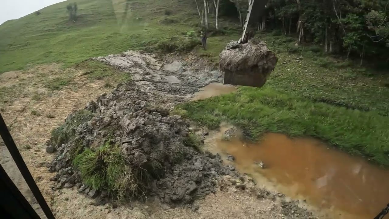 Limpeza de lagoa e tirando deslizamento