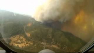 RAW Calif  National Guard Air Tanker Makes Drop Over Rim Fire Aug 23 2013