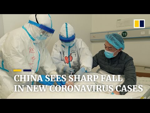 China sees sharp fall in new coronavirus cases as Beijing revises diagnosis protocol