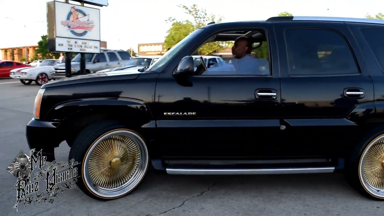ESCALADE ON CENTER GOLD 144 SPOKES!!!!