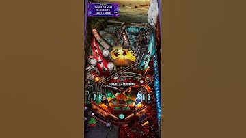 Hit the red cover three times on Godzilla Vs. Kong Pinball and you