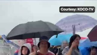 Trump supporters wait in the rain outside Choctaw Casino