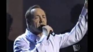 9 11 Moments, Kevin Spacey sings John Lennon, Mind Games