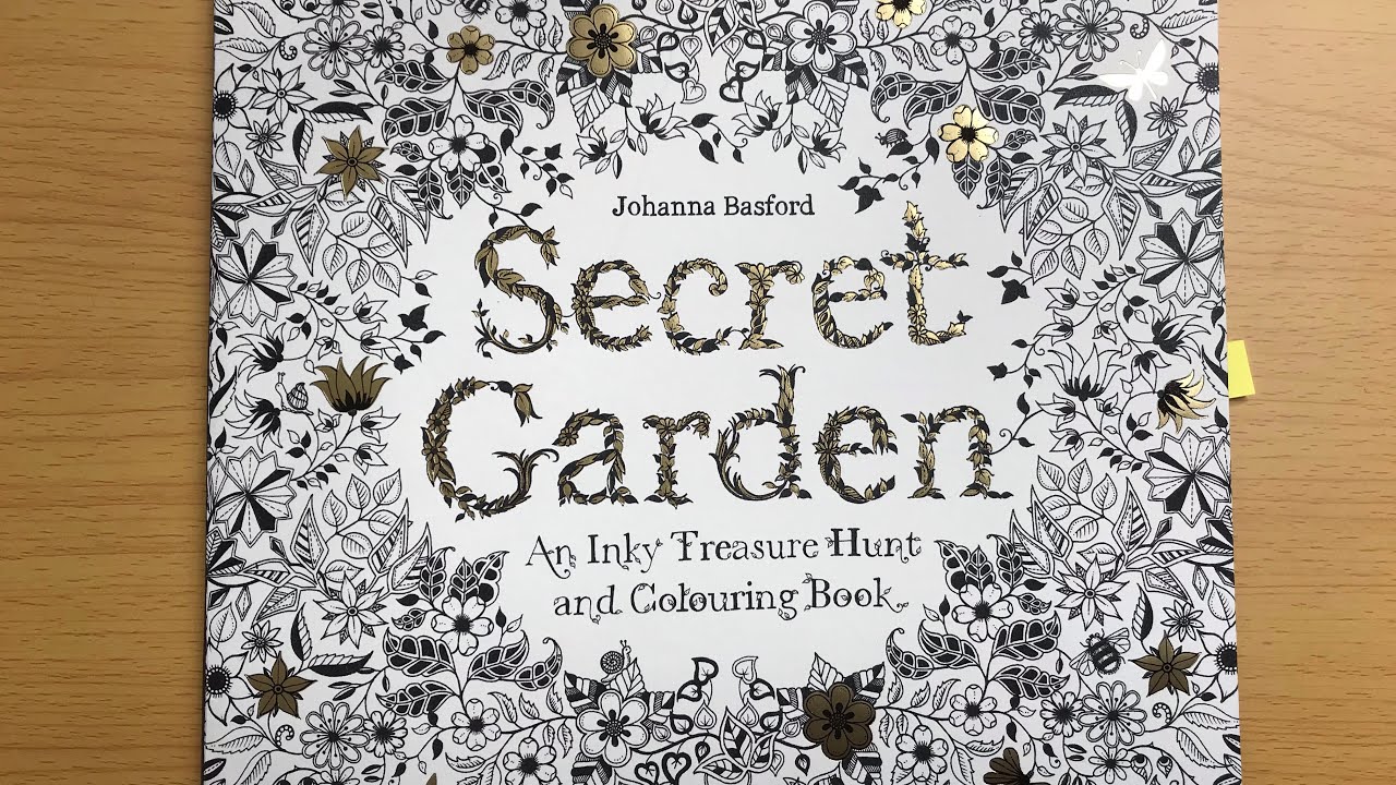 Completed pages in my first ever colouring book, Secret Garden