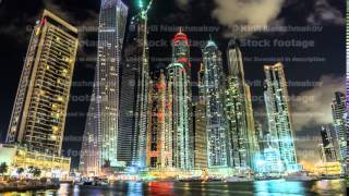 Close View of Dubai Marina tallest Towers in Dubai at night timelapse