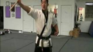 How to Use Nunchucks (Speed Chucks) : How to do Thumb Spins with Nunchucks