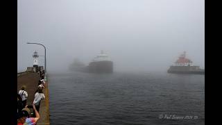 The Fog! Watch the Hon James L Oberstar come out of nowhere! Arriving Duluth to dump stone