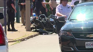 Two officers involved in motorcycle accident while escorting fallen officer's body